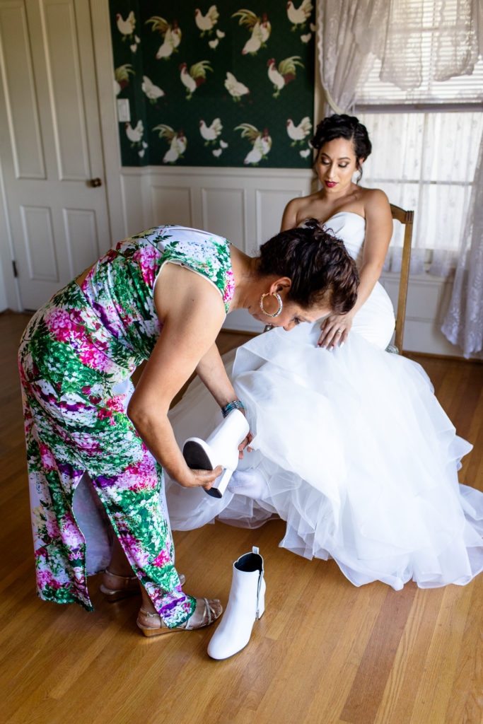 bride getting ready with her mom