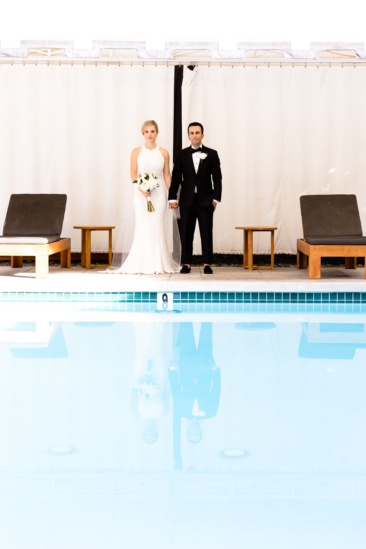 bride and groom portraits Avalon Hotel pool