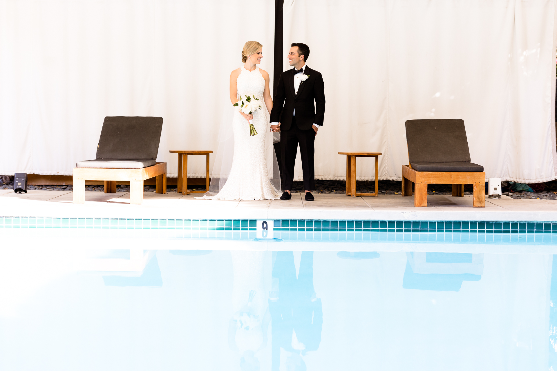 bride and groom portraits Avalon Hotel pool