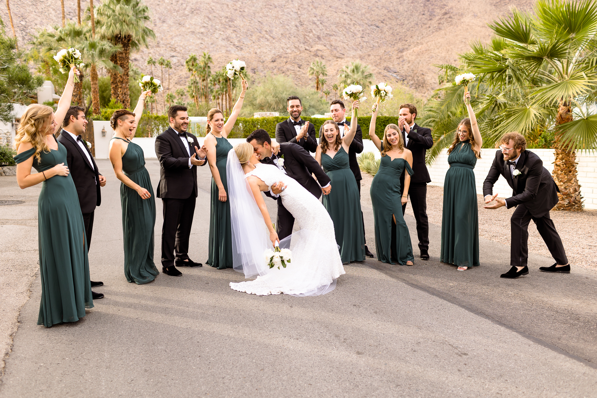 Bridal party portraits in Palm Springs, California - emerald bridesmaids dress inspiration