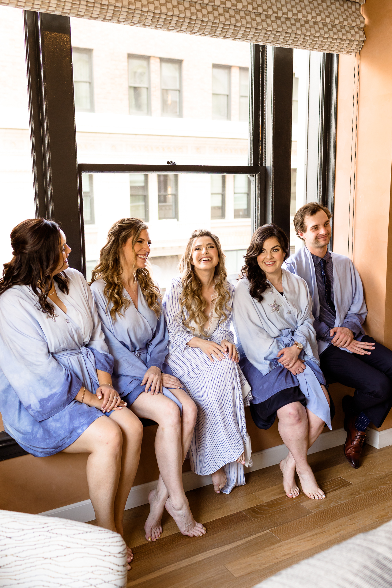 proper hotel bridal party getting ready - indigo blue robes