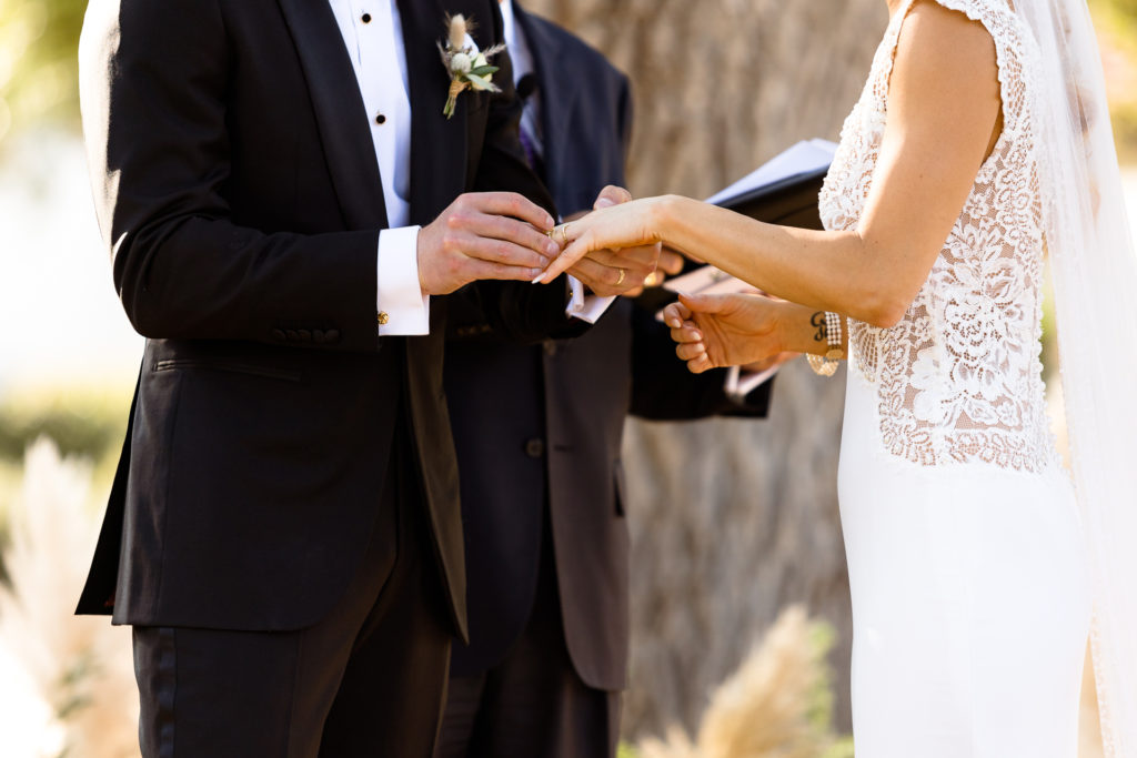 ojai valley inn oak tree wedding ceremony - exchanging rings