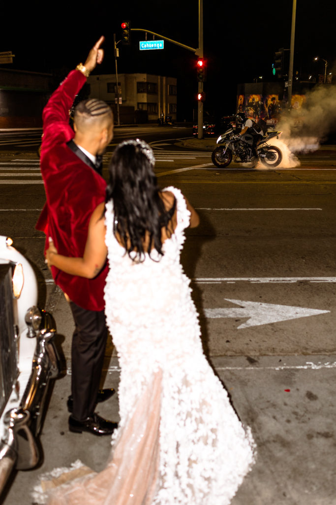 urban city nighttime direct flash photos of bride and groom, madera kitchen wedding photos
