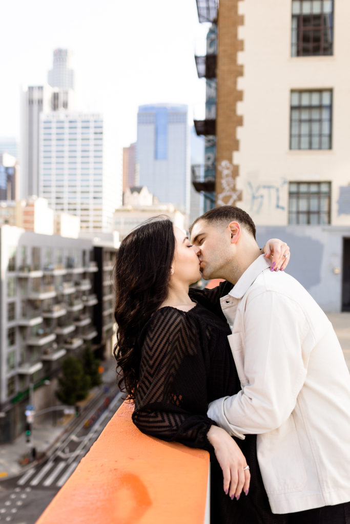 downtown los angeles engagment photoshoot, black dress, rooftop couples photos