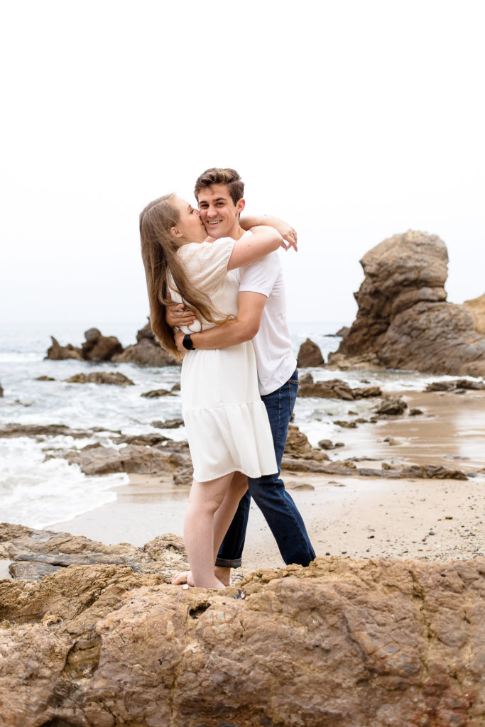 Little Corona Del Mar engagement photoshoot, white dress for engagement photos, beach couples photos
