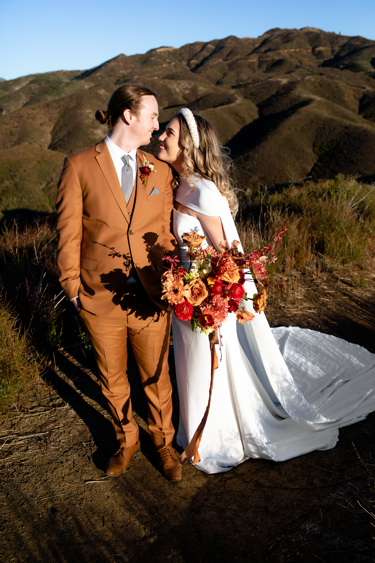 malibu mountain elopement, burnt orange friar tux, williams by pronovias bridal cape