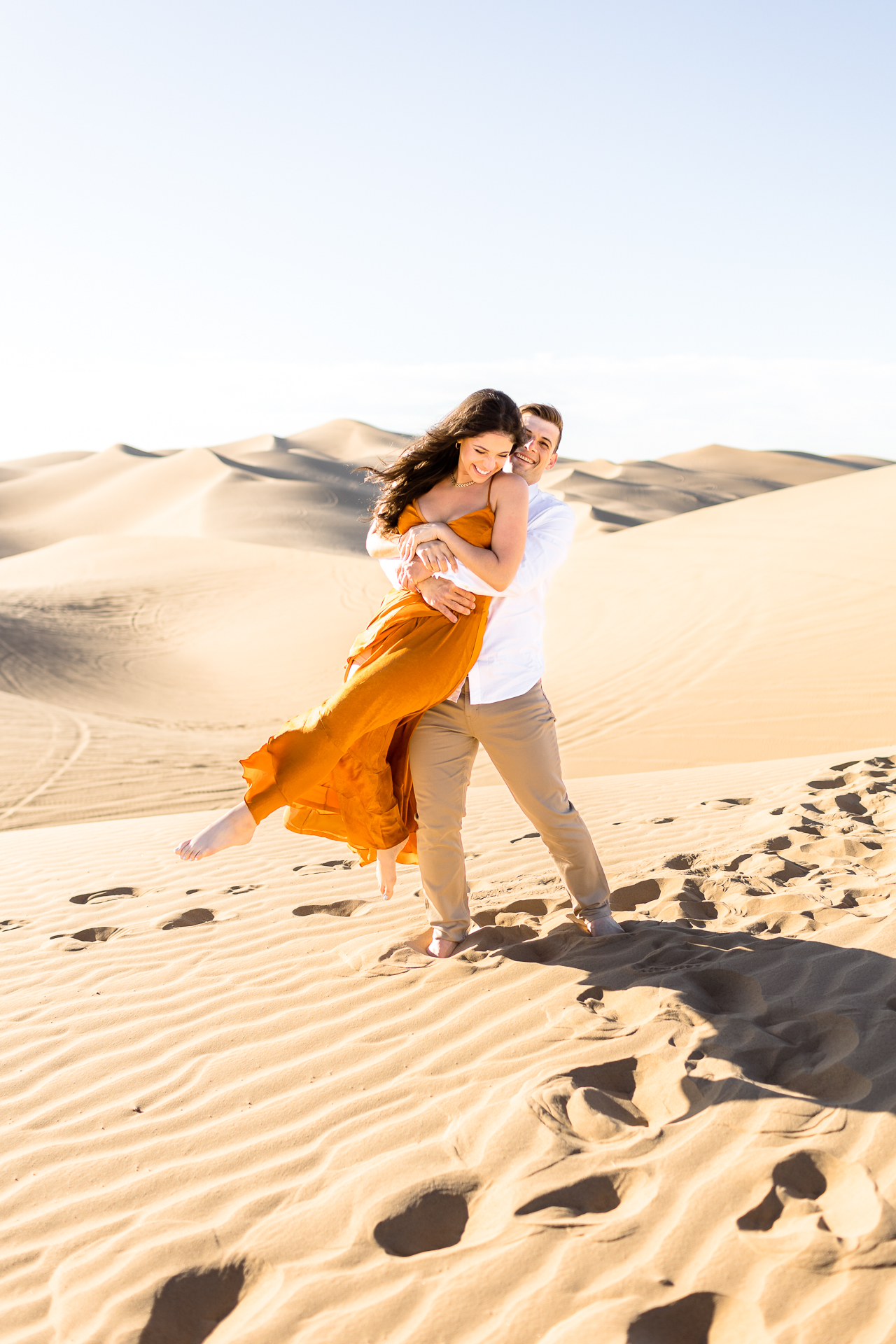 glamis sand dunes engagement photography, orange reformation dress